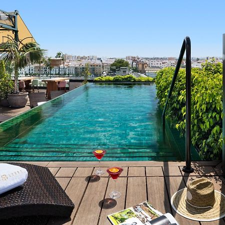 Hotel Lobby Севилья Экстерьер фото Rooftop pool