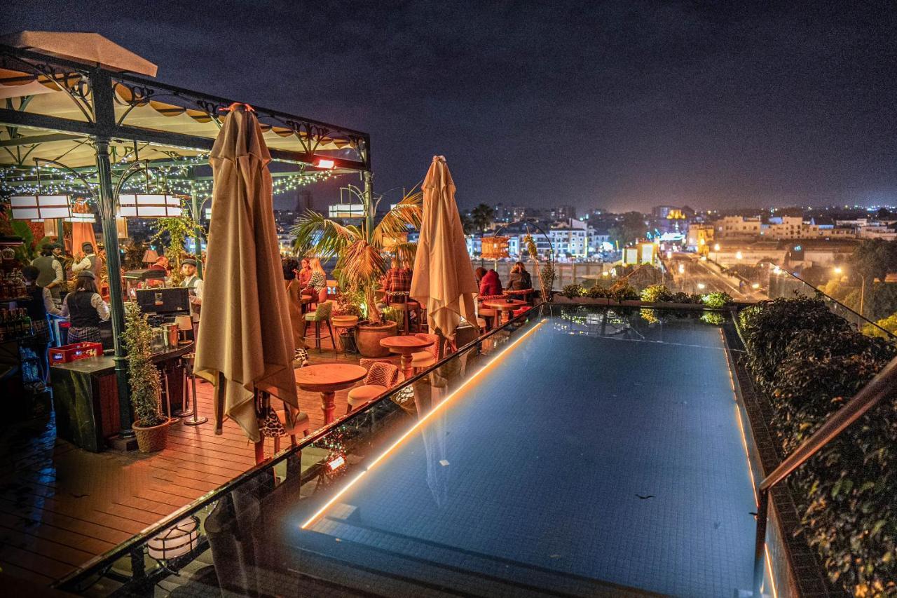 Hotel Lobby Севилья Экстерьер фото Rooftop bar in Marrakech, Morocco