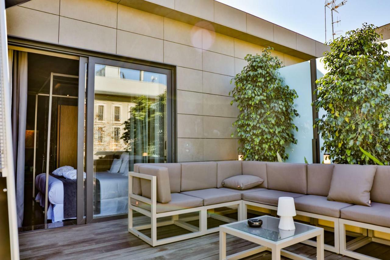 Hotel Lobby Севилья Экстерьер фото The hotel's rooftop
